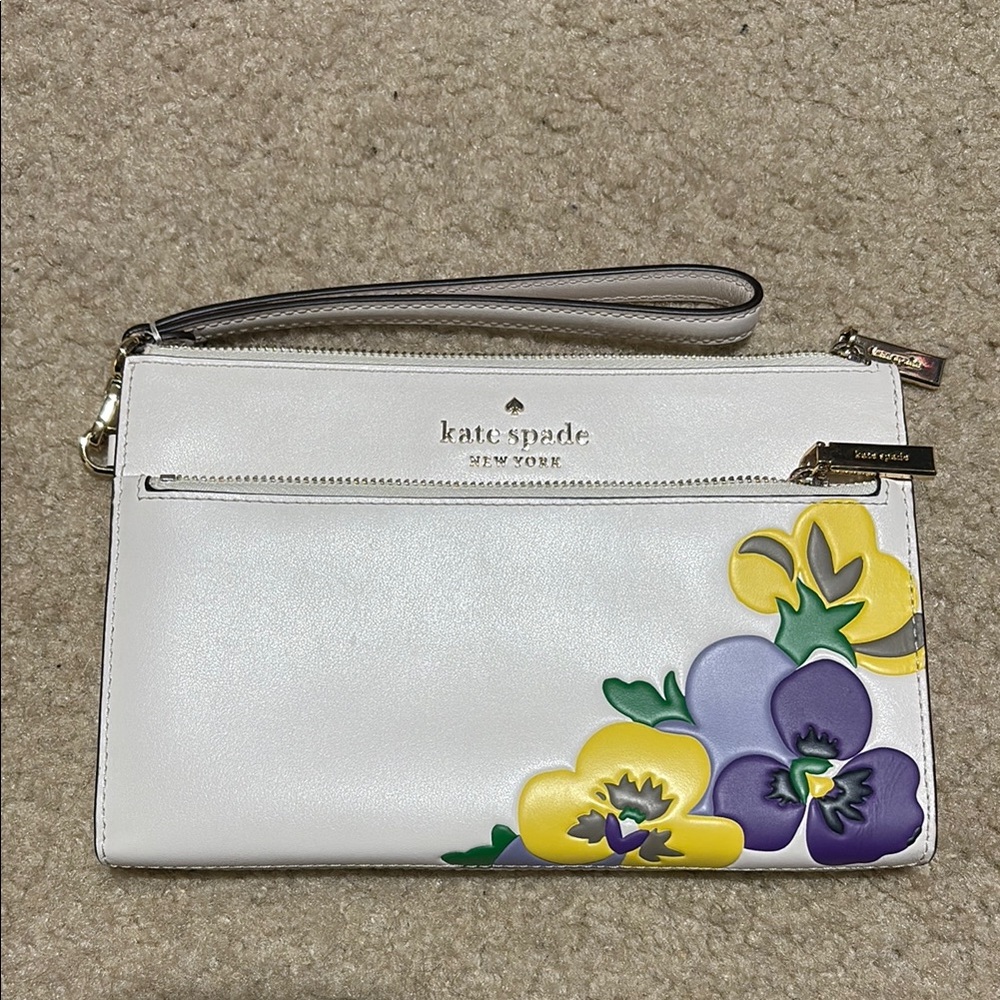 NWOB Kate Spade Beige Wristlet with Yellow and Purple Pansy Design